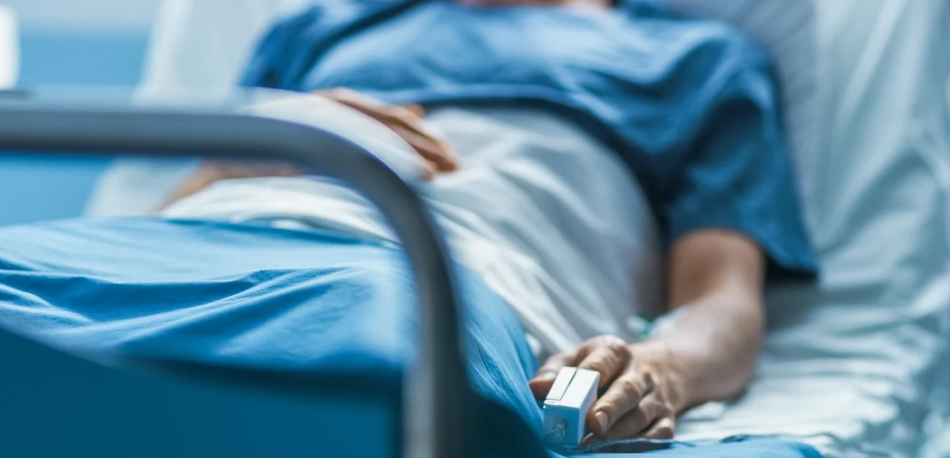 Person lay in hospital bed